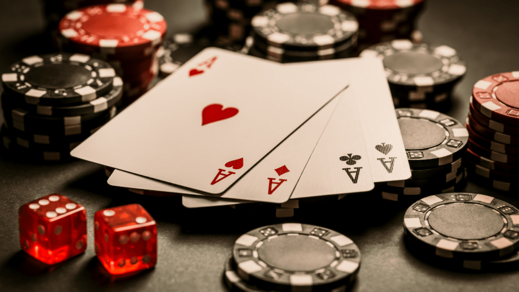 poker and casino chips on a black background