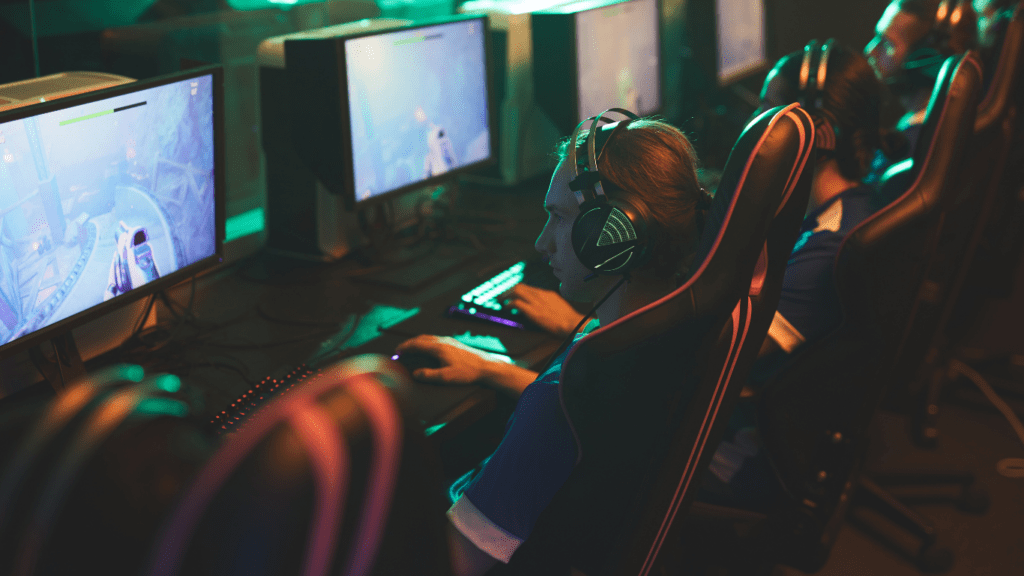 a group of people playing video games in a room