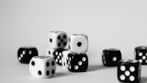 a group of dice on a white surface