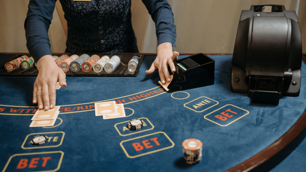 image of a person playing blackjack at a casino table