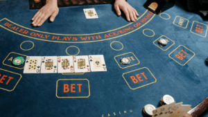 a casino table with several people playing blackjack