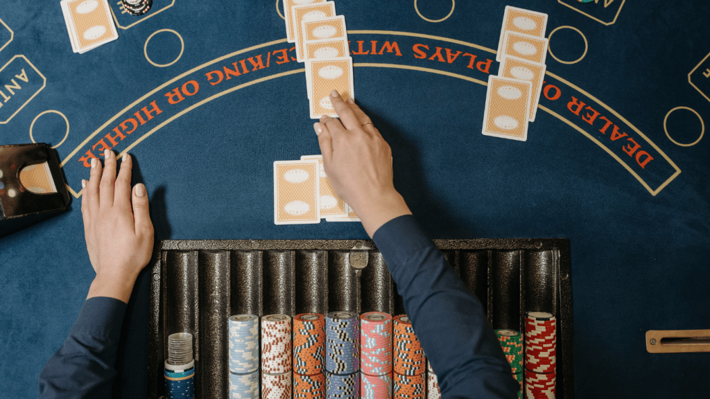 a casino table with people playing blackjack