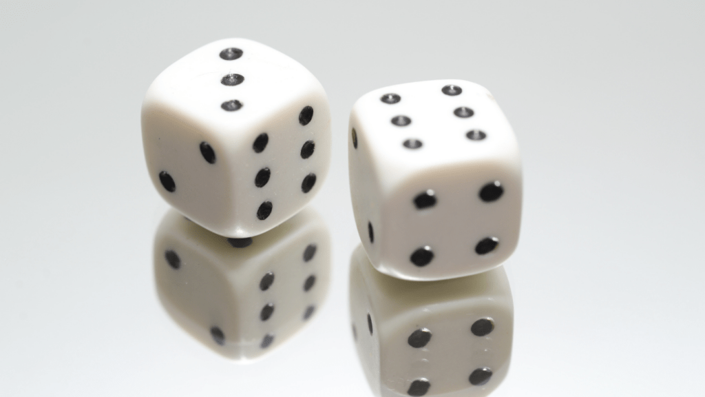 a group of dice on a white surface