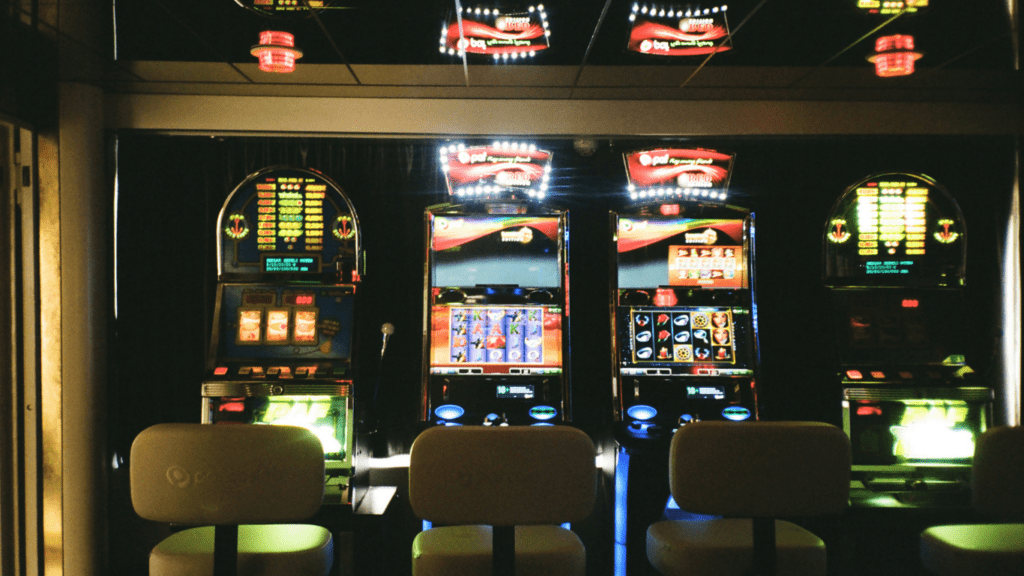 a row of slot machines in a casino