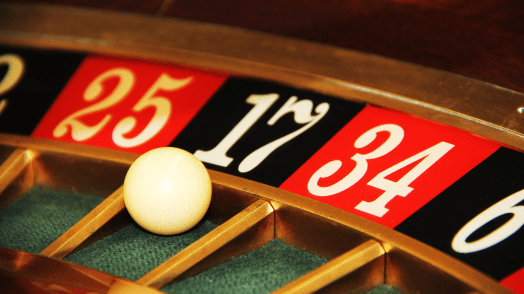 an image of a roulette wheel on a black background