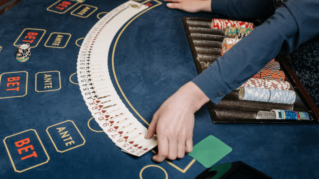 image of a person playing blackjack at a casino table