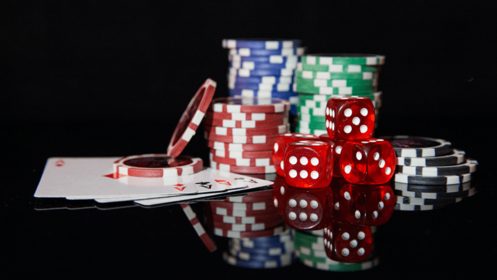 poker and casino chips on a black background