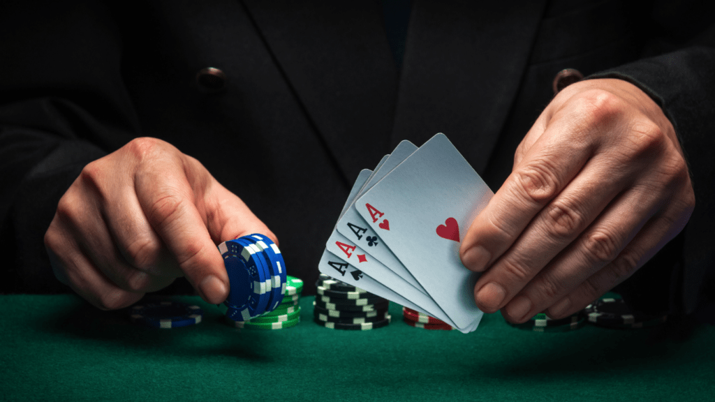 poker chips and money on a green table